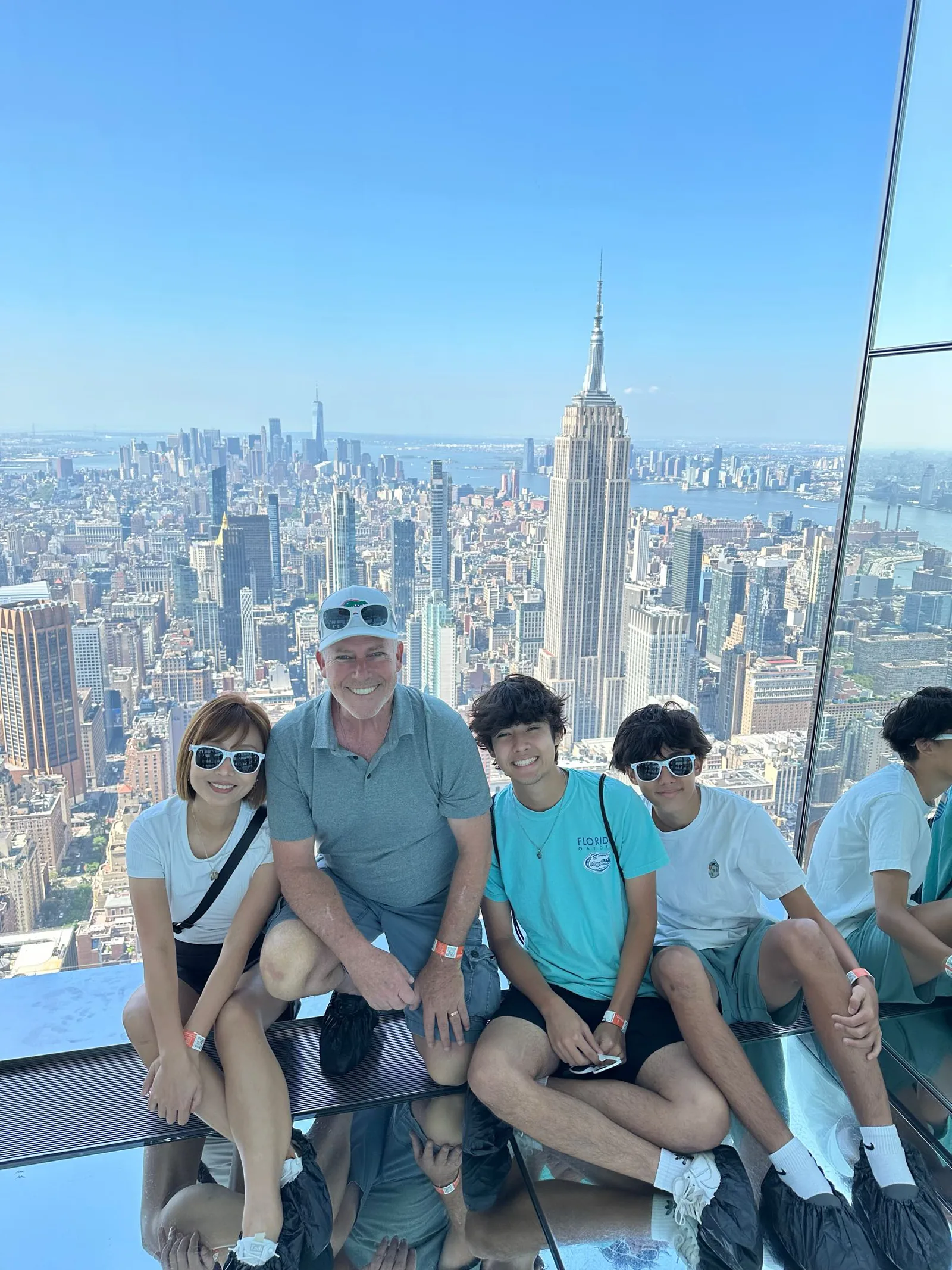 jaime with family overlooking the new york city skyline